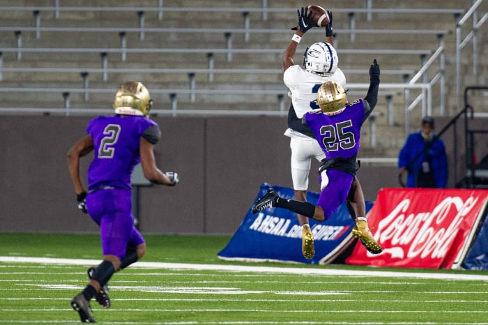 White bails out his quarterback on a 50/50 ball